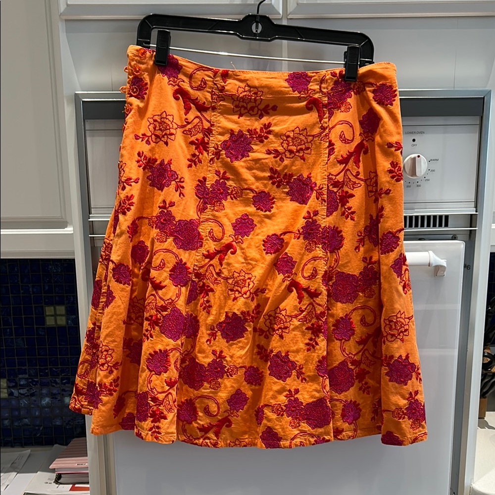 Johnny Was  size 6 skirt. Orange with red/fish is embroidered flowers.